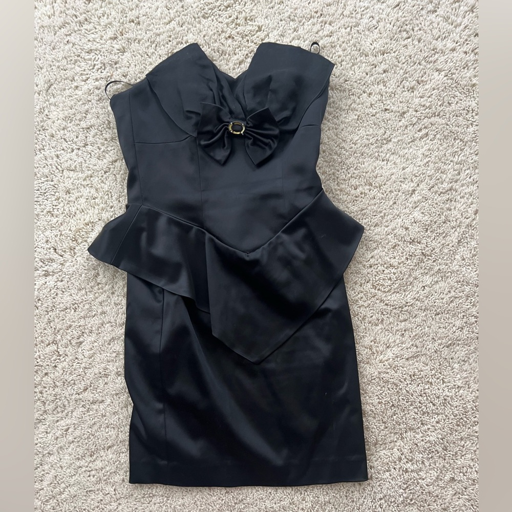Beautiful strapless black mini dress by Bebe.